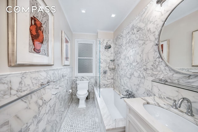 bathroom with tile walls, bathtub / shower combination, vanity, toilet, and ornamental molding