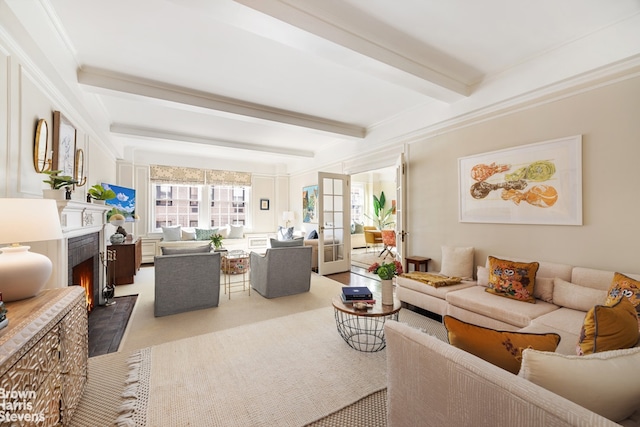 carpeted living room featuring beam ceiling, crown molding, and french doors