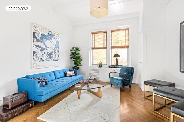 living room featuring parquet floors