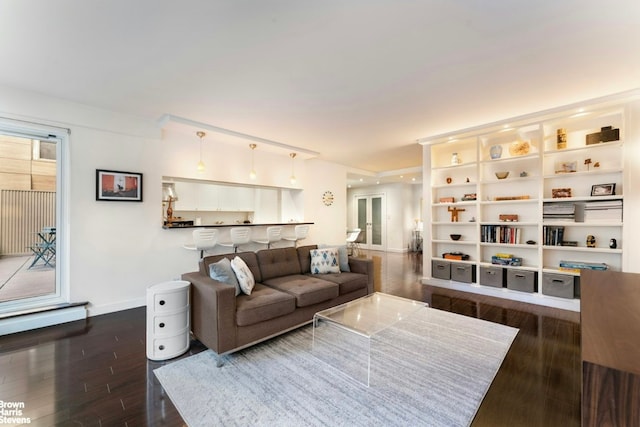 living room featuring dark wood-type flooring