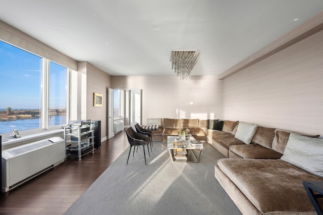 80 Riverside Blvd Unit Ph-1B, New York City, NY 10069 - living room with radiator, dark wood-style floors, and a water view