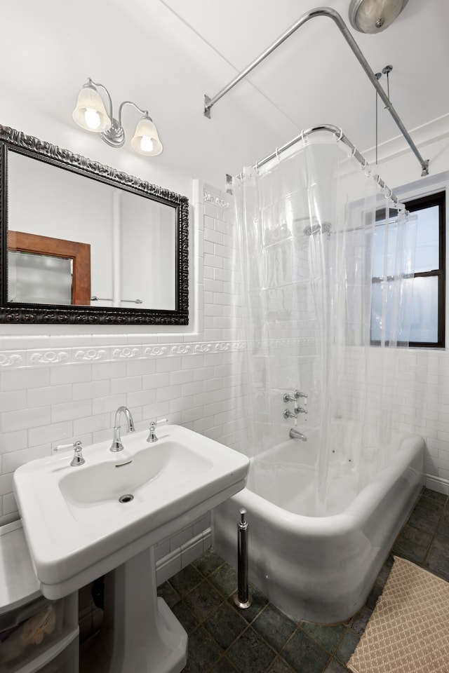 bathroom with tile walls, tile patterned floors, and shower / bath combination with curtain
