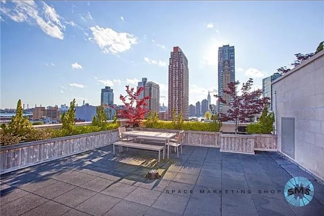 view of patio / terrace with a view of city