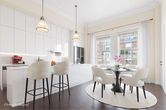 1 Sutton Pl S Unit 12D, New York City, NY 10022 - dining space featuring dark wood-style floors, ornamental molding, baseboards, and recessed lighting