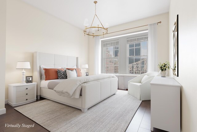 1 Sutton Pl S Unit 12D, New York City, NY 10022 - bedroom featuring a chandelier and wood finished floors