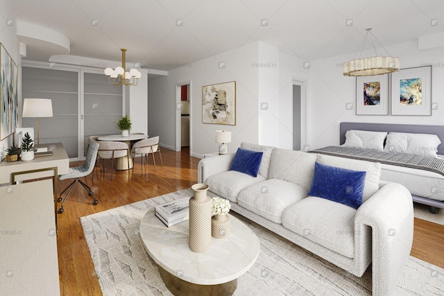 living room with a chandelier and wood finished floors