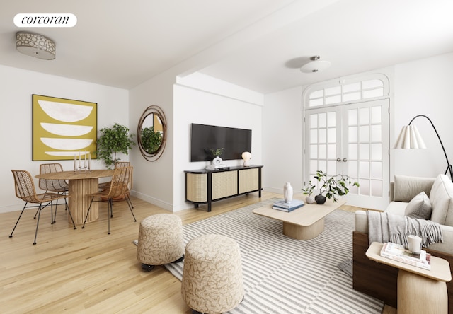 living area with baseboards, visible vents, wood finished floors, and french doors