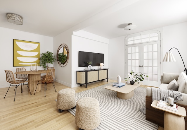 living area featuring baseboards, french doors, and wood finished floors