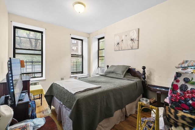 bedroom with light wood-type flooring