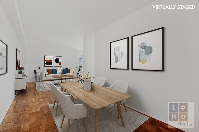 477 Fdr Dr Unit M1605, New York City, NY 10002 - dining area featuring baseboards