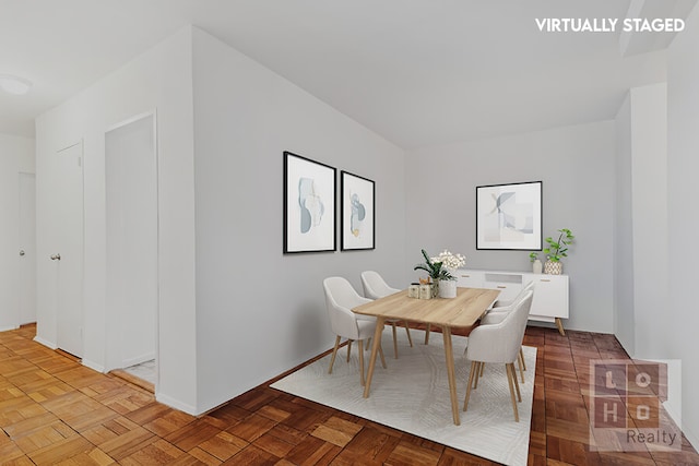 477 Fdr Dr Unit M1605, New York City, NY 10002 - dining room featuring baseboards