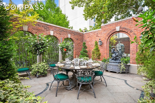 view of patio with outdoor dining area