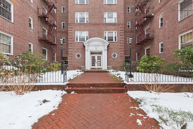 view of snow covered property