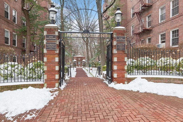 view of snow covered gate