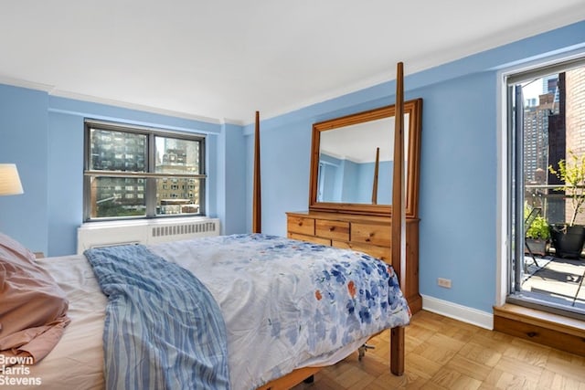420 E 55th St Unit 11M, New York City, NY 10022 - bedroom featuring access to exterior and crown molding