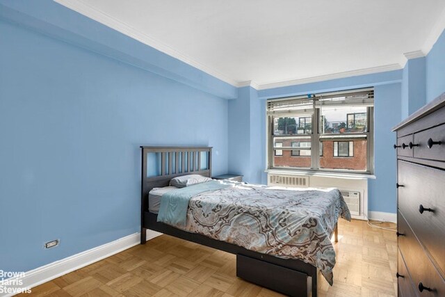 420 E 55th St Unit 11M, New York City, NY 10022 - bedroom with baseboards and ornamental molding