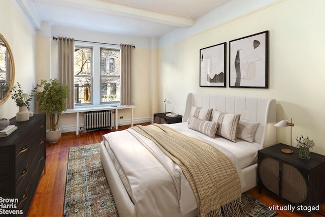 bedroom with dark wood-style floors, radiator, and beam ceiling