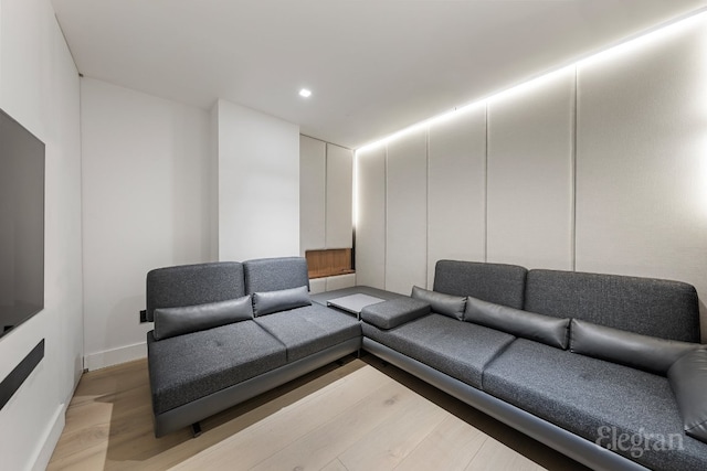 living room featuring recessed lighting and light wood finished floors