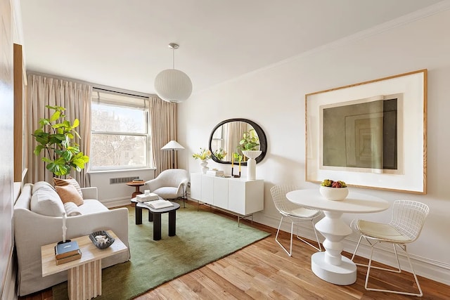 45 W 11th St Unit 5A, New York City, NY 10011 - sitting room featuring wood finished floors, ornamental molding, and baseboards