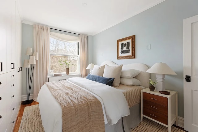 45 W 11th St Unit 5A, New York City, NY 10011 - bedroom featuring crown molding, baseboards, and light wood-type flooring