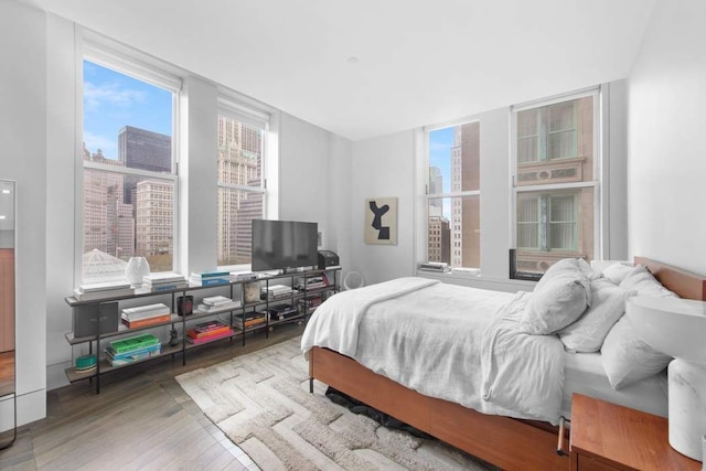 bedroom featuring wood finished floors