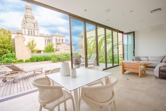 sunroom featuring visible vents