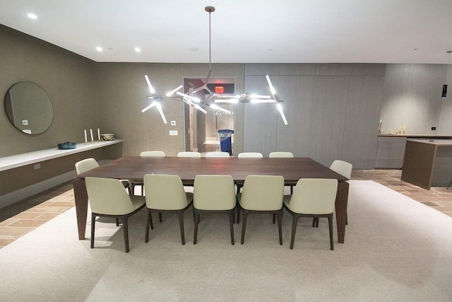 dining space featuring recessed lighting