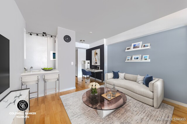 7 E 14th St Unit 1625, New York City, NY 10003 - living area with wood finished floors, baseboards, and an office area