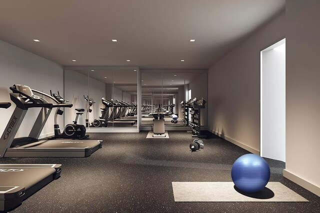 workout area with recessed lighting and baseboards