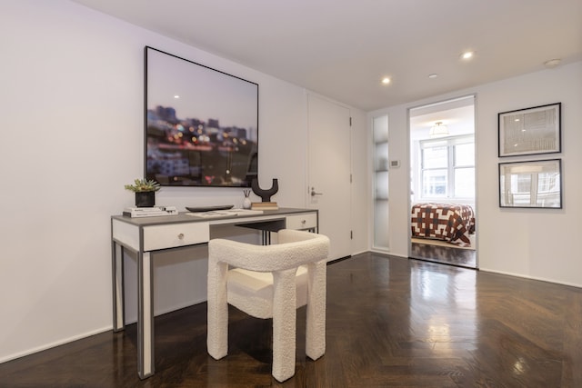 office with recessed lighting and baseboards