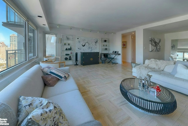 303 E 57th St Unit 32C, New York City, NY 10022 - living room featuring track lighting