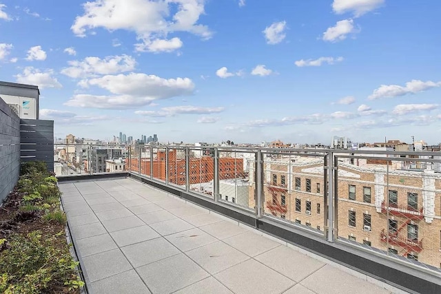 balcony featuring a view of city