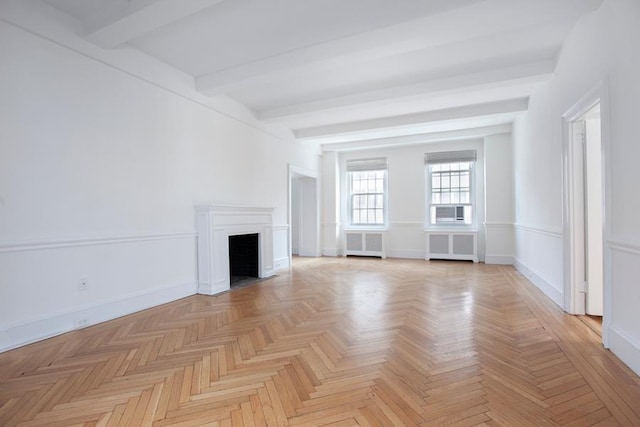 unfurnished living room featuring a fireplace with flush hearth, beam ceiling, baseboards, and radiator heating unit