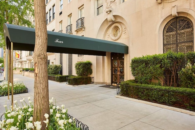 exterior space featuring stucco siding