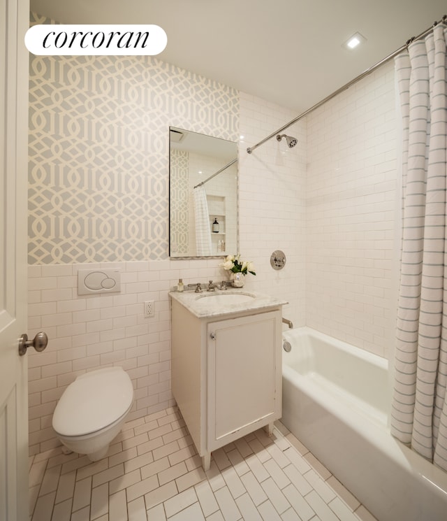 180 E 93rd St Unit 2, New York City, NY 10128 - full bathroom with tile walls, vanity, shower / bath combination with curtain, tile patterned floors, and wallpapered walls