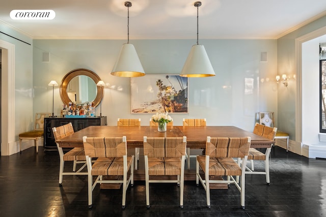 180 E 93rd St Unit 2, New York City, NY 10128 - dining area featuring crown molding and dark wood finished floors