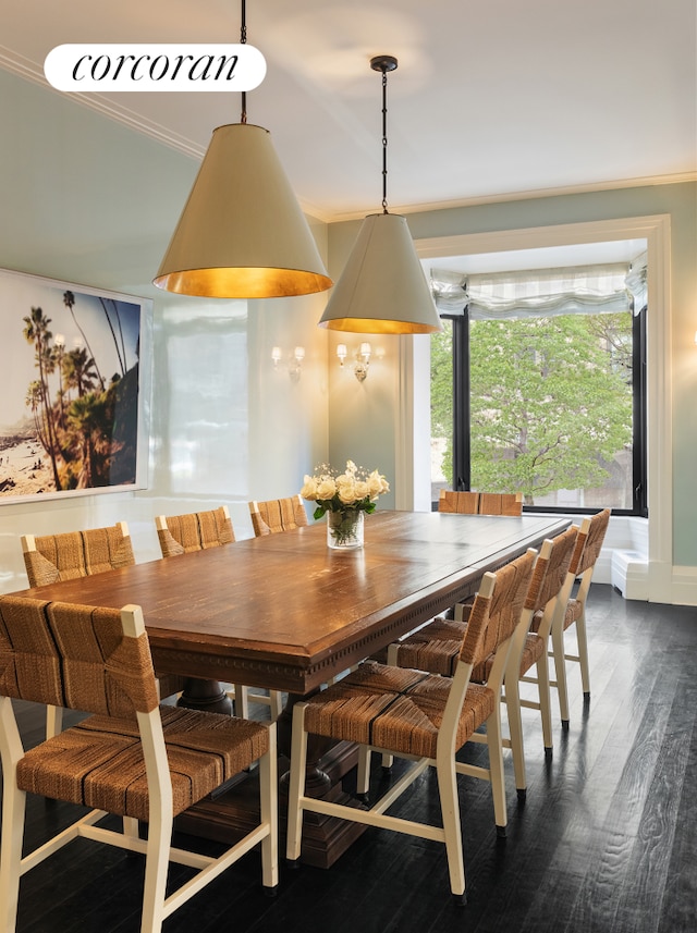 180 E 93rd St Unit 2, New York City, NY 10128 - dining space with dark wood finished floors and crown molding