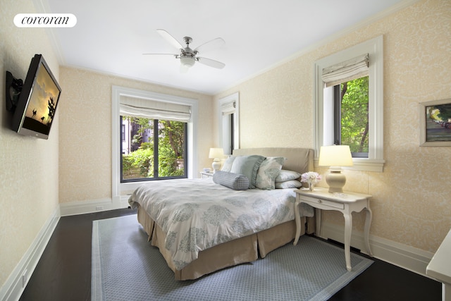 180 E 93rd St Unit 2, New York City, NY 10128 - bedroom with dark wood-style flooring, multiple windows, crown molding, ceiling fan, and baseboards