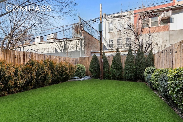 view of yard with fence