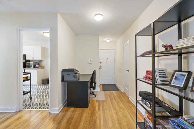 143 Bennett Ave Unit 2R, New York City, NY 10040 - office area with light wood-style floors and baseboards