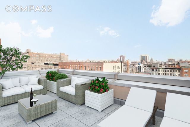 view of patio / terrace with a view of city and an outdoor hangout area