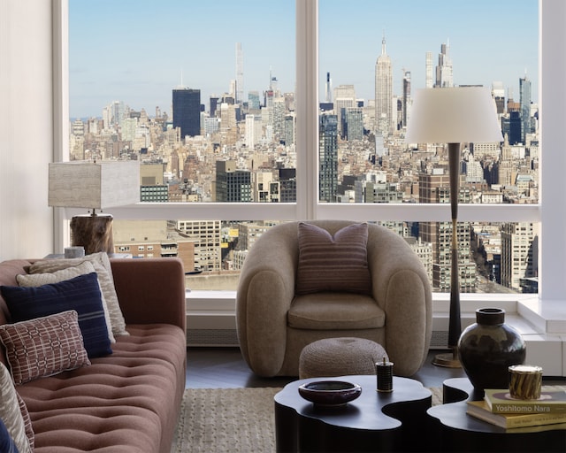 living area featuring a view of city