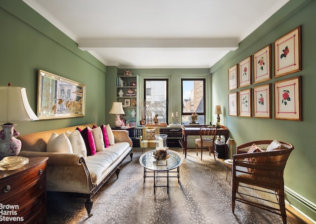 living area with ornamental molding and beamed ceiling