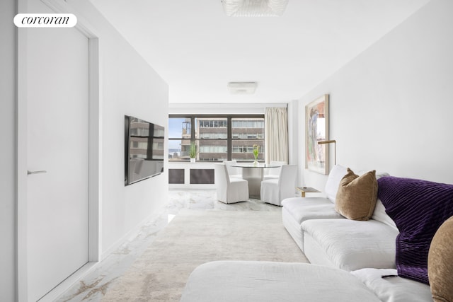 living room with marble finish floor and visible vents