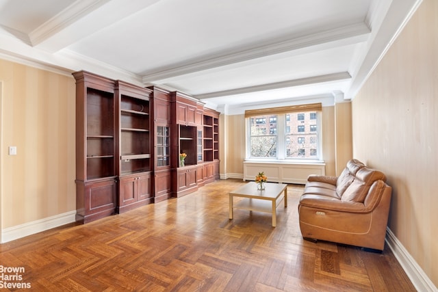 living area with crown molding, baseboards, and beamed ceiling