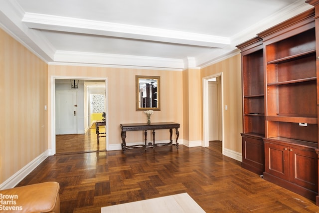 interior space featuring baseboards, crown molding, and wallpapered walls