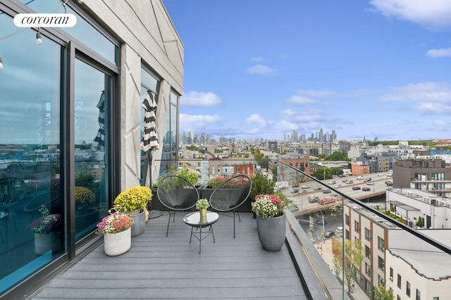 balcony featuring a city view