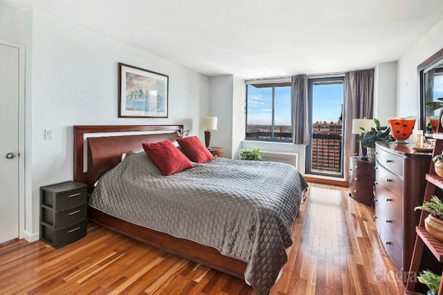 bedroom featuring wood finished floors