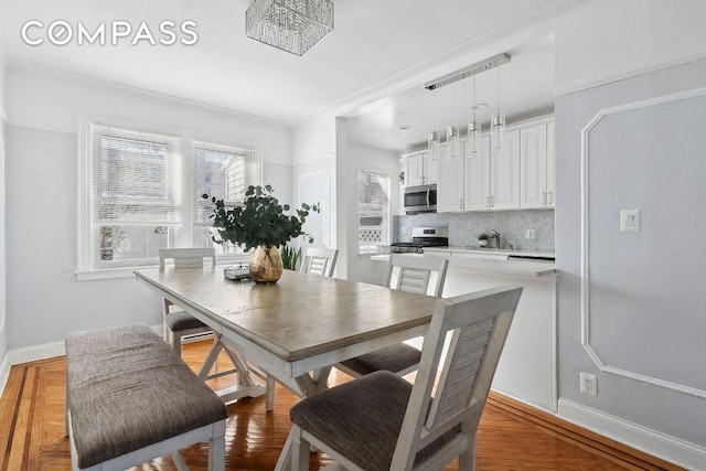 dining room with baseboards