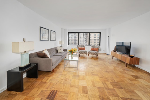 living room featuring baseboards